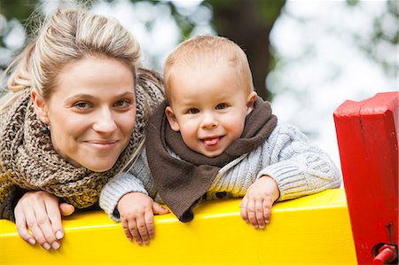 family and happy and outside and play - Mother and son on a jungle gym, portrait, Osijek, Croatia Stock Photo - Premium Royalty-Free, Code: 6115-07539785
