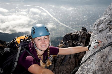 Female alpinist rock climbing, Innsbruck route, Tyrol, Austria Photographie de stock - Premium Libres de Droits, Code: 6115-07539814