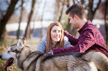 simsearch:6115-07539619,k - Couple with Dog Outdoors, Croatia Fotografie stock - Premium Royalty-Free, Codice: 6115-08066371