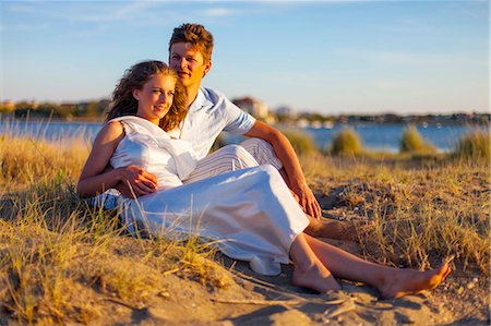 simsearch:6115-07109837,k - Happy couple sitting on beach, Dalmatia, Croatia Stock Photo - Premium Royalty-Free, Code: 6115-08066325