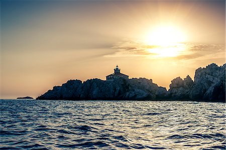 simsearch:6119-07451619,k - Lighthouse at sunset, Greben, Dubrovnik Photographie de stock - Premium Libres de Droits, Code: 6115-08066601