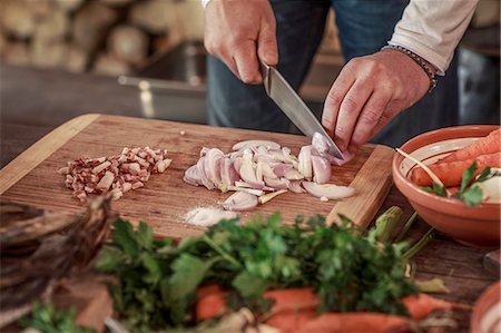 preparation - Person cutting onions Stock Photo - Premium Royalty-Free, Code: 6115-08066605