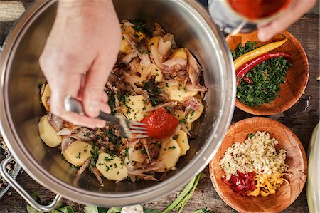 sprecare - Person preparing potato salad Stock Photo - Premium Royalty-Free, Code: 6115-08066614