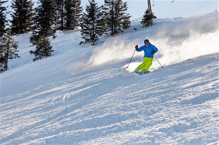 Ski holiday, Skier carving downhill, Sudelfeld, Bavaria, Germany Stock Photo - Premium Royalty-Free, Code: 6115-08149348