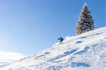simsearch:6115-08149365,k - Ski holiday, Man skiing downhill, Sudelfeld, Bavaria, Germany Photographie de stock - Premium Libres de Droits, Code: 6115-08149311