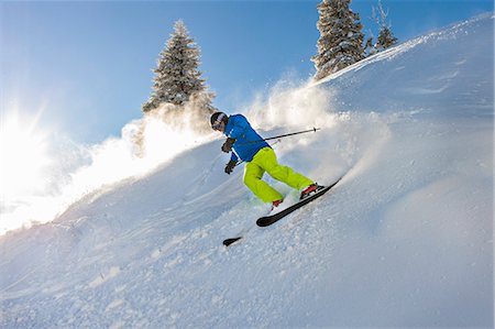 simsearch:6115-06967096,k - Ski holiday, Man skiing downhill, Sudelfeld, Bavaria, Germany Stock Photo - Premium Royalty-Free, Code: 6115-08149314