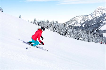simsearch:6115-08149365,k - Ski holiday, Woman skiing downhill, Sudelfeld, Bavaria, Germany Photographie de stock - Premium Libres de Droits, Code: 6115-08149325