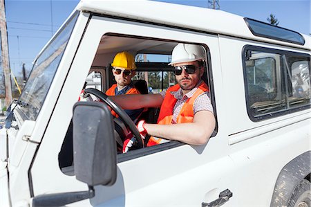 european electric car photos - Two engineers in car taking a break Stock Photo - Premium Royalty-Free, Code: 6115-08149421