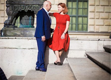 stairs and city - Senior couple falling in love, Munich, Bavaria, Germany Stock Photo - Premium Royalty-Free, Code: 6115-08100684