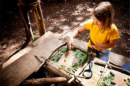 education camp - Girl crafting in a forest camp, Munich, Bavaria, Germany Stock Photo - Premium Royalty-Free, Code: 6115-08100816