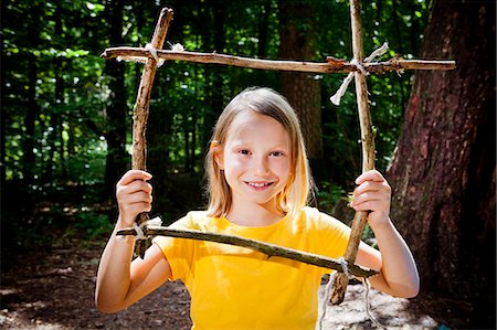 education camp - Girl crafting in a forest camp, Munich, Bavaria, Germany Stock Photo - Premium Royalty-Free, Code: 6115-08100818