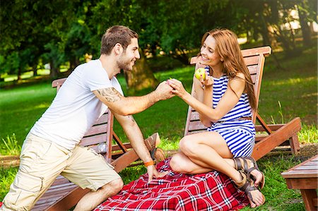 simsearch:6115-08101193,k - Young couple falling in love in the meadow Stock Photo - Premium Royalty-Free, Code: 6115-08101095