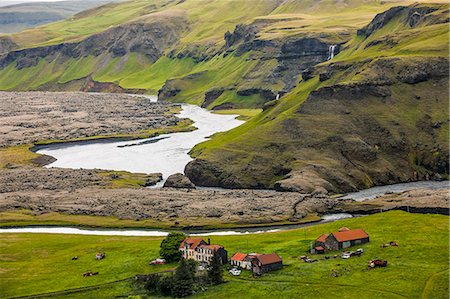 Farm buildings in rocky landscape, Iceland Stock Photo - Premium Royalty-Free, Code: 6115-08101198