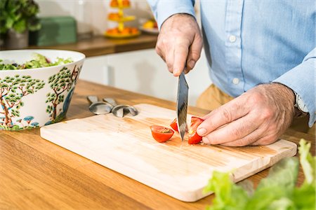 preparation - Person preparing salad Stock Photo - Premium Royalty-Free, Code: 6115-08104875