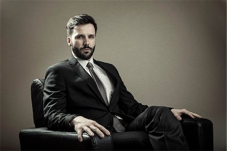 photo of fashion stage - Portrait of businessman in full suit Stock Photo - Premium Royalty-Free, Code: 6115-08104956