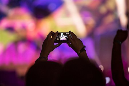 Young people having fun at music concert Stock Photo - Premium Royalty-Free, Code: 6115-08105215