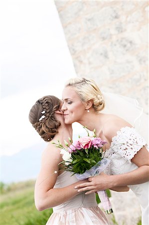 simsearch:6115-08239477,k - Happy bride embracing girlfriend Stock Photo - Premium Royalty-Free, Code: 6115-08239375