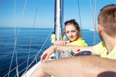 simsearch:6115-06733079,k - Young couple together on sailboat, Adriatic Sea Stock Photo - Premium Royalty-Free, Code: 6115-08239664