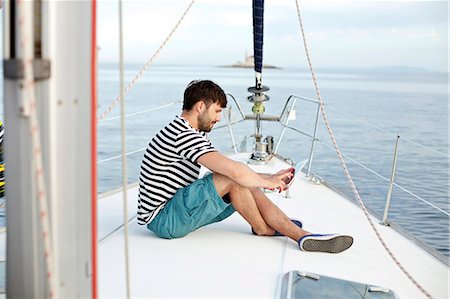 simsearch:6115-06733085,k - Man using digital tablet on sailboat, Adriatic Sea Stockbilder - Premium RF Lizenzfrei, Bildnummer: 6115-08239799
