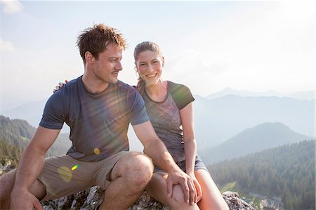 satisfaction landscape - Young couple having fun on mountain peak Stock Photo - Premium Royalty-Free, Code: 6115-08239862