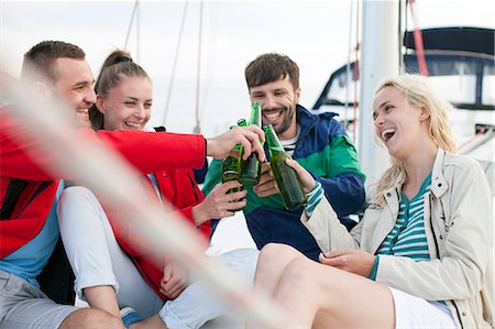 simsearch:6115-08101096,k - Group of friends drinking beer on sailboat, Adriatic Sea Stock Photo - Premium Royalty-Free, Code: 6115-08239811