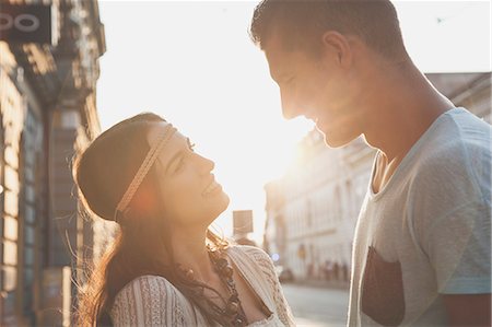 simsearch:6115-08239929,k - Young couple in hippie style fashion falling in love Stock Photo - Premium Royalty-Free, Code: 6115-08239928