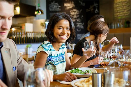 simsearch:6115-08416263,k - Group of friends on dinner party in restaurant Stock Photo - Premium Royalty-Free, Code: 6115-08416277