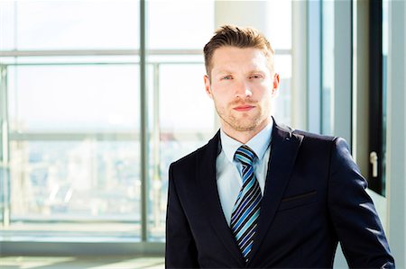 Portrait of well-dressed businessman Stock Photo - Premium Royalty-Free, Code: 6115-08416295