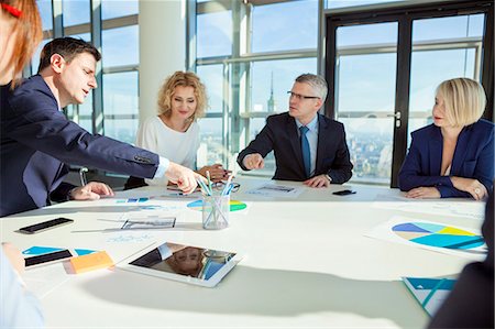 simsearch:6115-08416163,k - Team of architects in business meeting Stock Photo - Premium Royalty-Free, Code: 6115-08416312