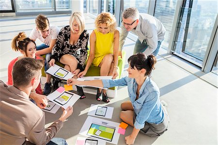simsearch:6115-08416263,k - Team of architects in business meeting Stock Photo - Premium Royalty-Free, Code: 6115-08416339