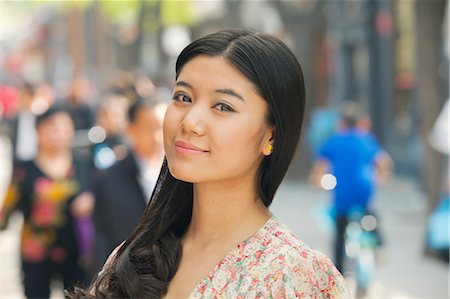 simsearch:6116-07085962,k - Young Woman smiling looking at camera Stock Photo - Premium Royalty-Free, Code: 6116-06938575