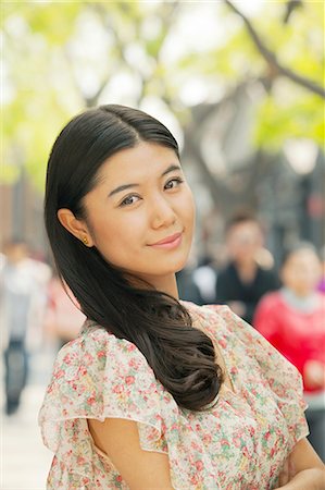 simsearch:6116-07085962,k - Young Woman smiling looking at camera Stock Photo - Premium Royalty-Free, Code: 6116-06938576