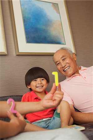 senior man laughing family - grandson playing with grandparents Photographie de stock - Premium Libres de Droits, Code: 6116-06938657