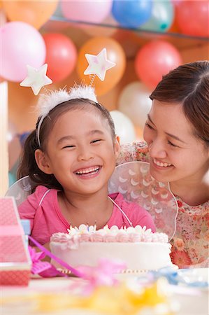 pink cake - Birthday Girl and Her Mother Stock Photo - Premium Royalty-Free, Code: 6116-06938741