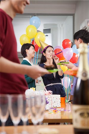Colleagues Having Fun At Office Party Photographie de stock - Premium Libres de Droits, Code: 6116-06938876