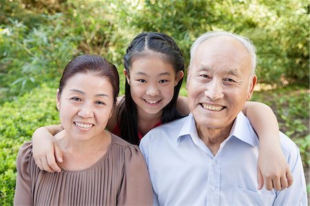 simsearch:6116-08311918,k - Senior Couple with Granddaughter Stock Photo - Premium Royalty-Free, Code: 6116-06938817