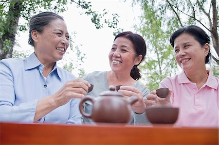 east asian cuisine - Group of mature women drinking Chinese tea in the park Stock Photo - Premium Royalty-Free, Code: 6116-06939052