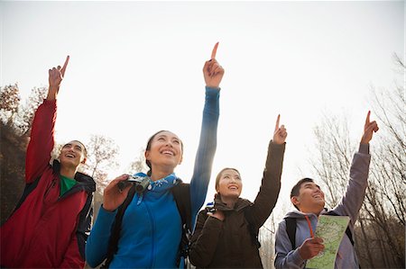 people studying nature - Group of young people pointing to the mountain top Stock Photo - Premium Royalty-Free, Code: 6116-06939156