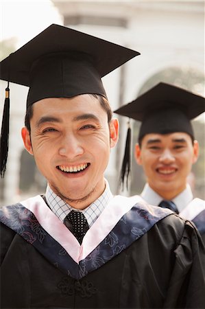 simsearch:6116-06939099,k - Young Graduates in Cap and Gown Stock Photo - Premium Royalty-Free, Code: 6116-06939199