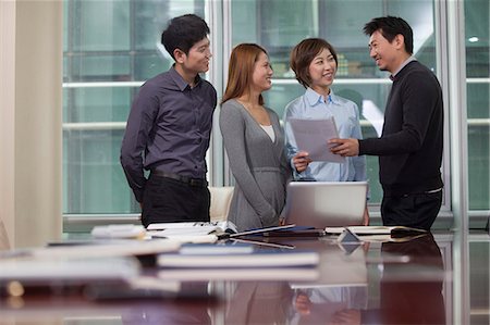 Businesspeople Working Together Stock Photo - Premium Royalty-Free, Code: 6116-06939124