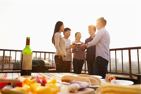 roof man - Sunset at Rooftop Barbecue Stock Photo - Premium Royalty-Free, Code: 6116-06939245