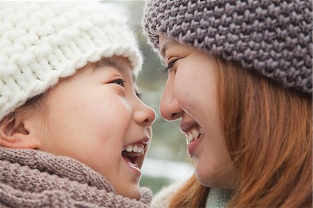 Mother and daughter nose to nose portrait Stock Photo - Premium Royalty-Free, Code: 6116-06939554