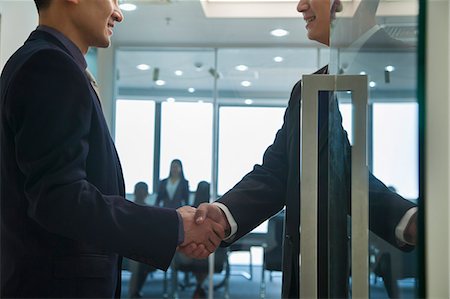 east asian meeting office - Businessmen Shaking Hands Stock Photo - Premium Royalty-Free, Code: 6116-06939581