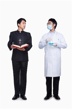 full body image of person in lab coat - Priest and scientist Stock Photo - Premium Royalty-Free, Code: 6116-07085015