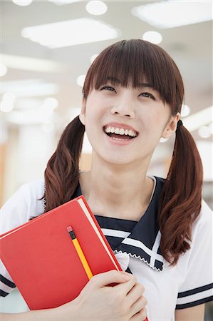 simsearch:6116-06939226,k - Girl with Notepad Stock Photo - Premium Royalty-Free, Code: 6116-07085028