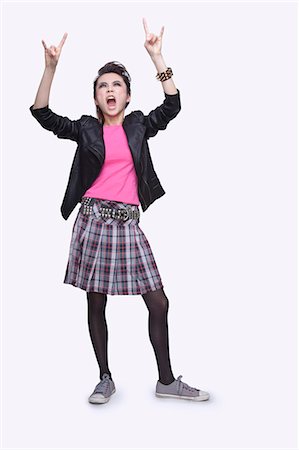 simsearch:6116-07084961,k - Punk Rock Girl Gesturing Foto de stock - Sin royalties Premium, Código: 6116-07085035