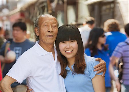 simsearch:6116-07236502,k - Portrait of grandfather and granddaughter together, outdoors in Beijing Stock Photo - Premium Royalty-Free, Code: 6116-07085283