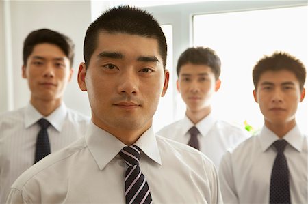 simsearch:6116-07086540,k - Businessmen in the office, portrait Stock Photo - Premium Royalty-Free, Code: 6116-07085345