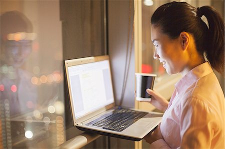 young woman working in the office Stock Photo - Premium Royalty-Free, Code: 6116-07085330