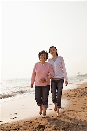 Grandmother and Granddaughter Taking a Walk by the Beach Stock Photo - Premium Royalty-Free, Code: 6116-07085979
